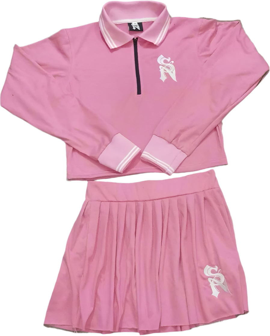Pink sports outfit with a skirt on a gray surface
